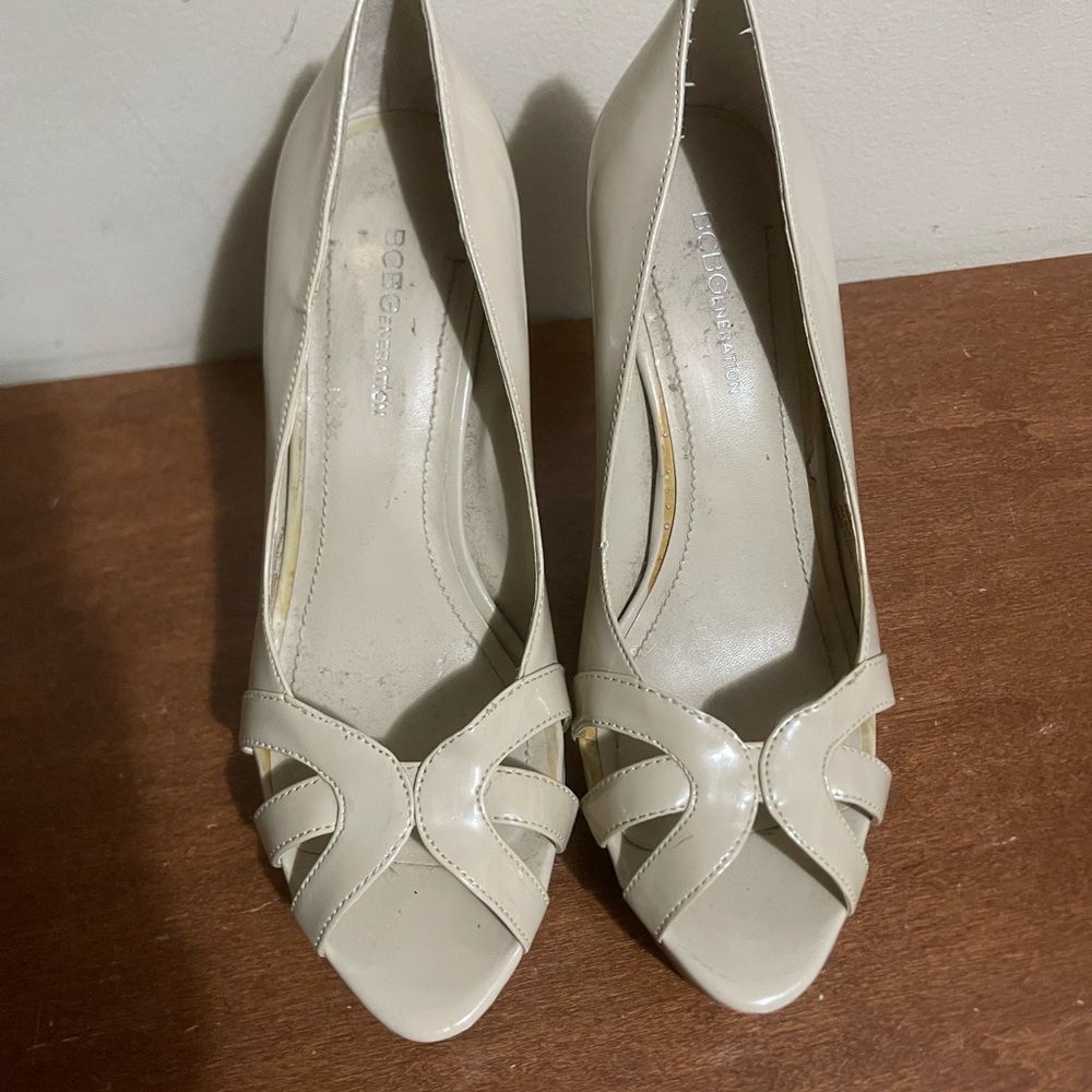 Size 8 nude peep toe heels by BCBG